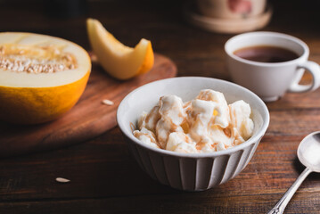 Melon Ice Cream with Fruit Syrup in Bowl