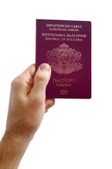 Man holding an Bulgarian passport against a white background