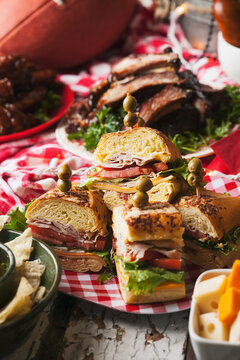 Fototapeta Football: Plate Of Sandwiches And Other Game Food