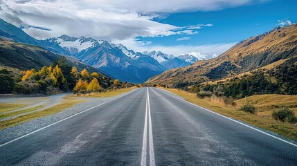 Fototapeta premium Asphalt highway road and green meadow with mountain nature landscape generated