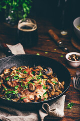 Fried pork neck steak with different mushrooms