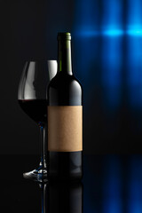 Bottle of red wine with old empty label.