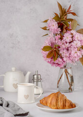 Food photography of croissant and coffee; Cappuccino; Breakfast; Caffeine; Baked; Flower; Gourmet; Eating; Latte; tea with milk