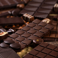 assorted chocolate bars and candy, delicious dessert food. sweet chocolate background