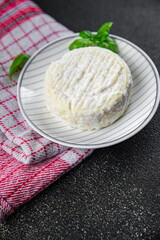 soft cheese cow milk, goat or sheep cheese natural fresh appetizer meal food snack on the table copy space food background rustic top view