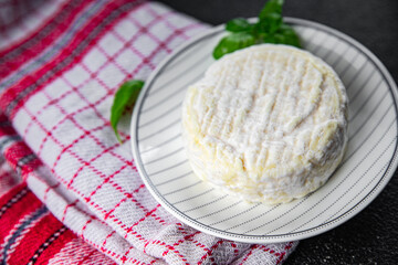 soft cheese cow milk, goat or sheep cheese natural fresh appetizer meal food snack on the table copy space food background rustic top view