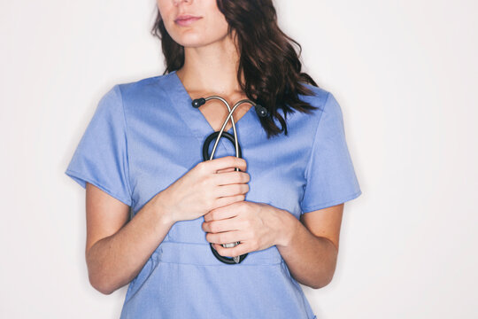 Medical: Nurse Holds Stethoscope In Front Of Body