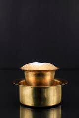 South Indian Filter coffee served in a traditional brass or stainless steel cup