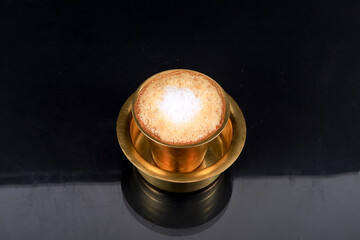 South Indian Filter coffee served in a traditional brass or stainless steel cup