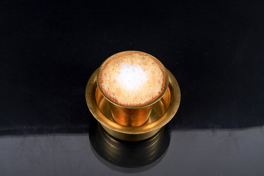 South Indian Filter coffee served in a traditional brass or stainless steel cup