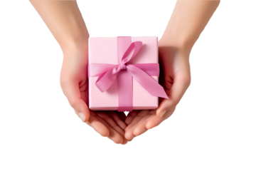 pair of hands gently holding a pink gift box tied with a satin ribbon. The gift is offered against a plain dark background, drawing attention to the brightly colored package.