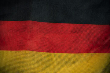 Germany nation flag on crumpled fabric background , country flag