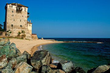 An old tower on the sea shore in the town of Ouranoupolis (Greece), called the Gate of Mount Athos