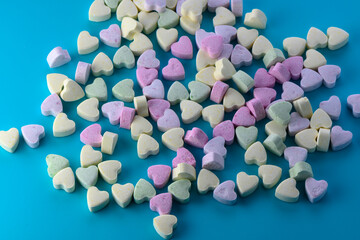 Top view of colorful jelly hearts shaped for background