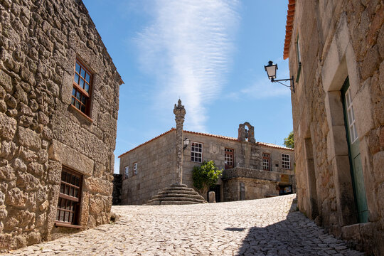 Sortelha, Portugal, 10.06.2019 - Gothic houses made of stone on deserted alley in Sortelha Castel.