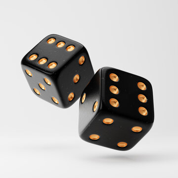 Rolling black and gold dice isolated over white background. 3D rendering.