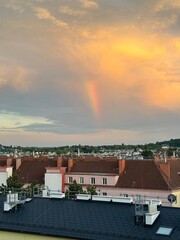 Thunderstorm Cell with Rainbow and Blue Sky"