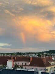 Thunderstorm Cell with Rainbow and Blue Sky"