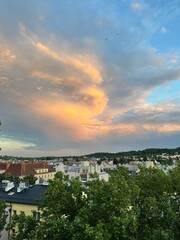 Thunderstorm Cell with Rainbow and Blue Sky"