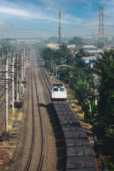 Obraz premium View of a passenger train traveling in a rural area