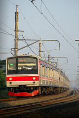 Obraz premium View of a passenger train traveling in a rural area