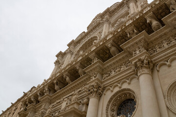 Obraz premium Closeup of the details in the Basilica of Santa Croce church in the historic center of Lecce, Italy.