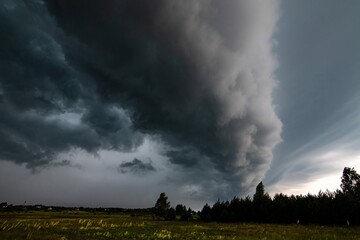 Extreme thunderstorm shelf cloud. Summer landscape of severe weather. Lithuania 2024