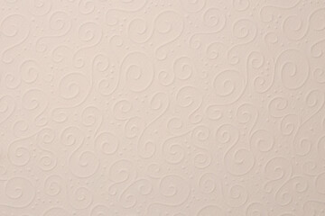 Beige paper blank with waves pattern. Texture relief copy space wallpaper background.