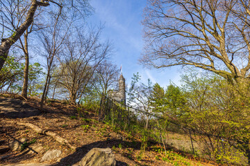 Obraz premium Beautiful upward view of Belvedere Castle in Central Park, New York, on a sunny spring day. USA. 