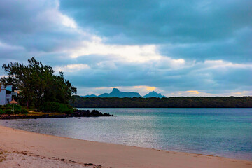 A stunningly picturesque beach on a cloudy day in Mauritius