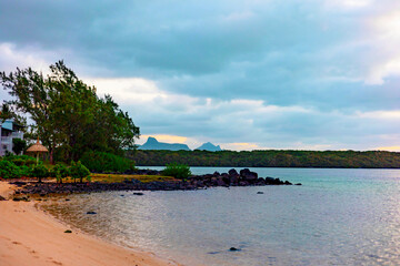 A stunningly picturesque beach on a cloudy day in Mauritius