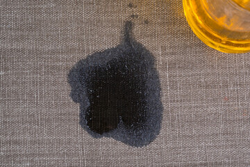 Grease stains fabric sofa or rug. daily life stain concept. 
