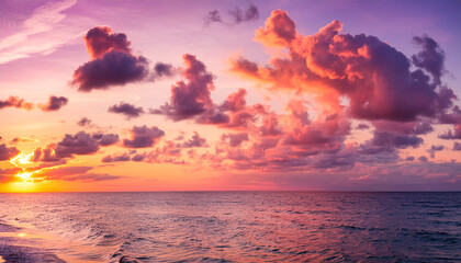 Fototapeta premium Beautiful sunset over the sea. Colorful sky with clouds.