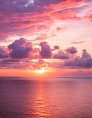 Fototapeta premium Beautiful sunset over the sea. Colorful sky with clouds.
