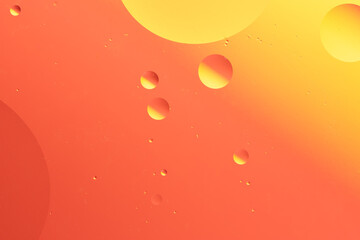 Red and yellow circles on an abstract background.