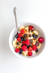 A morning breakfast yogurt bowl with berries and toppings