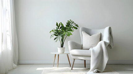 Modern minimal home interior design with gray armchair, white pillow, blanket, and table with green potted plant on a light wall background. Bright and elegant with copy space.