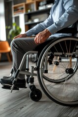 Fototapeta premium Businessman in wheelchair hand on wheel close up office