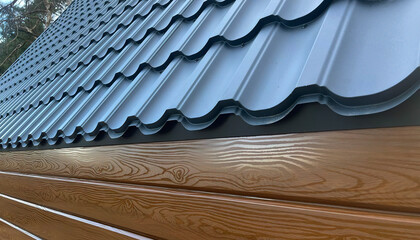 Metal roof, building materials, iron lining imitation of wooden beams.