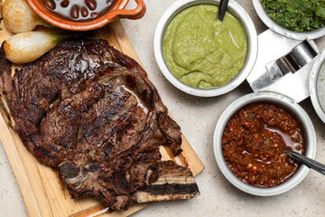 Mexican homemade steak with sauces and sides