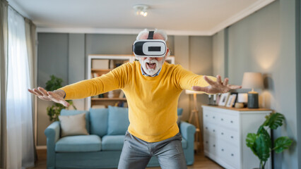 man mature senior male at home enjoy virtual reality VR headset