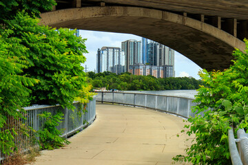 Pedestrian walkway under the South Congress bridge along Lady Bird Lake Austin Texas
