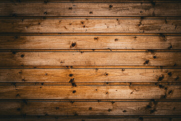 Horizontal rustic wood planks. Brown wooden wall background, strong vignette