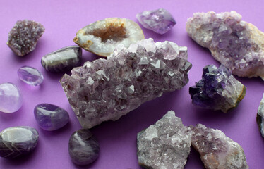 Beautiful purple drusy crystals and amethyst geodes close up. Healing crystals.