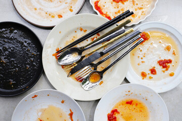 Dirty dishes, cleaning cooking utensils concept