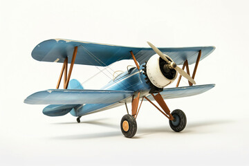 Fototapeta premium Detailed photo of a classic blue biplane model, showcasing its double wings and propeller, isolated on a clean white backdrop