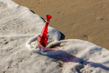 Bottles washed up at the Beach in the surf
