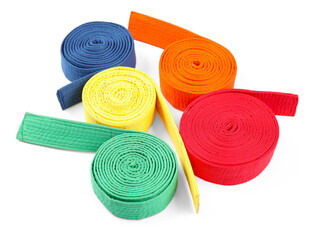 Many different karate belts isolated on white, above view