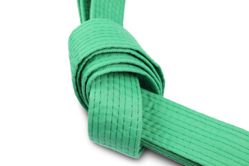 Green karate belt isolated on white. Martial arts uniform