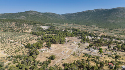 Fototapeta premium The Epidaurus Ancient Theatre is a theatre in the Greek old city of Epidaurus dedicated to the ancient Greek God of medicine, Asclepius.